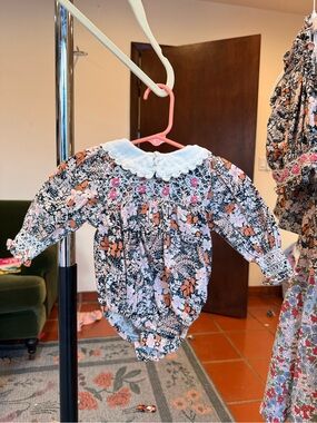 Smocked Floral Long-Sleeve Baby One-Piece in Pink and Black